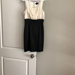 Cream top, black bottom dress